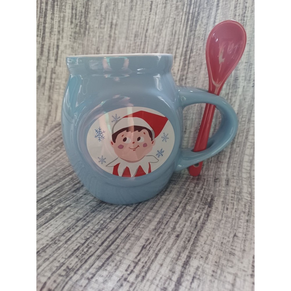 2017 Frankford Candy Elf mug with spoon. Approximately 4.5" tall.